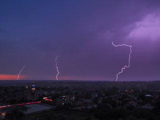 Lightnings at the field at the sunset