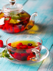 raspberry berry tea kettle cup fresh wooden

