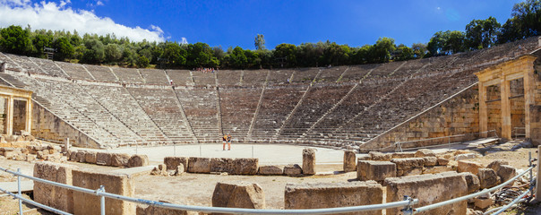 Epidaurus, Greece ,April 24,2016.Turists admire the ancient theater of the Epidaurus