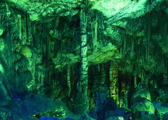 Under ground. beautiful view of stalactites and stalagmites in underground cavern. Dikteo Andro...
