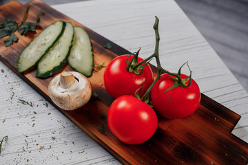 tomatoes on a board