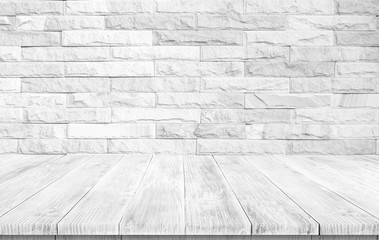 Empty top of wooden table on white brick background. For display or montage your products