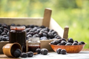 Organic plum fruit products, jar of jam. Plum jam.