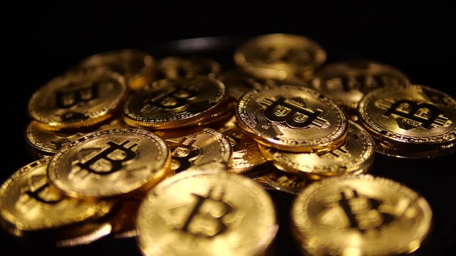 Macro closeup of crypto currency Bitcoin spinning coins