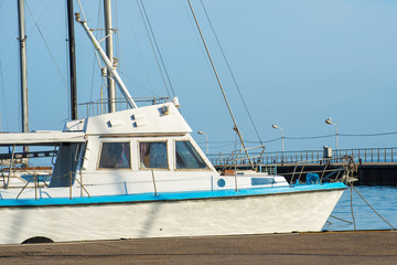 Fototapeta premium The yacht is parked in the roadstead and ready for travel