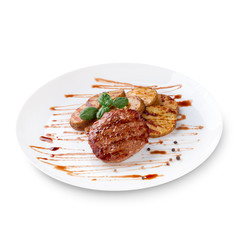 Grilled steak, baked potatoes, green basil and sauce on white plate