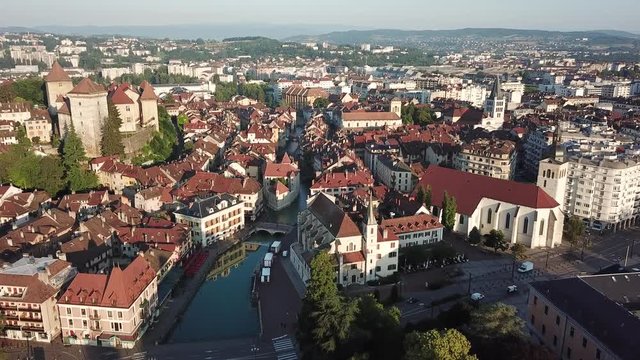 drone aerial panoramic view of Annecy city, France, historical rooftop architecture of old town center, beautiful cityscape 