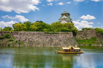 Tourist sightseeing Boat ride around the Osaka Castle.
