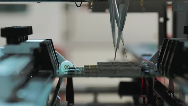 Robotic Machine Testing Circuit Boards for Serviceability