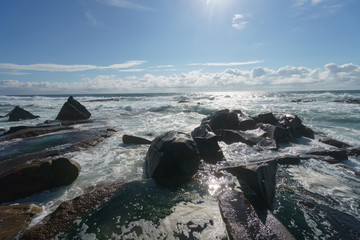 Ocean daytime landscape, giving strength. The space is filled water, spray and ocean noise