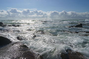 Ocean daytime landscape, giving strength. The space is filled water, spray and ocean noise