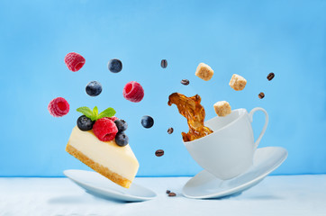 Flying cup of coffee with cheesecake