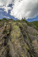 Remains and ruins of medieval fortress called Anevo Kale in Stara Planina mountain near Sopot, Bulgaria, vertical landscape taken at evening towards North