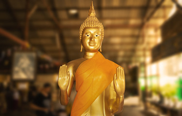 buddhist temple with golden buddha vishnu gods statue - phuket, thailand