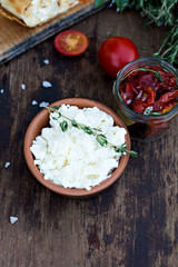 Cheese and sun dried tomatoes and herbs.