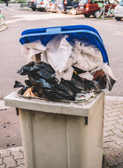 Big public waste garbage bin in residential neighborhood in France