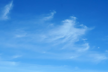 Blue sky and white clouds. White clouds on blue background.