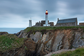 Fototapeta na wymiar Lighthouse and ruin of monastery, Pointe de Saint Mathieu, Brittany (Bretagne), France