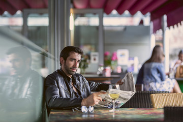 Man reading business newspaper