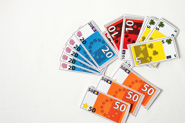 children's toy euros on a white background, concept business and finance, fictitiousness