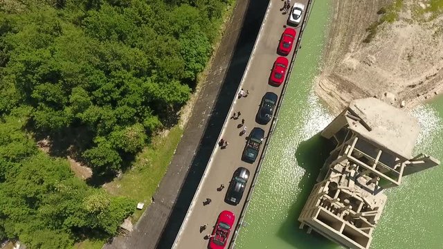 Fly over a row of american muscle GT cars