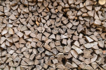 Pile of many wood logs - timber texture.