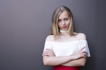 Fototapeta premium Portrait of a girl with white hair and clean skin with dark background