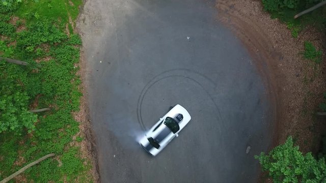 A Dodge Challenger Doing Donuts