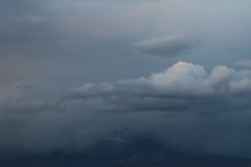 Obraz premium dark moody clouds before a stoem