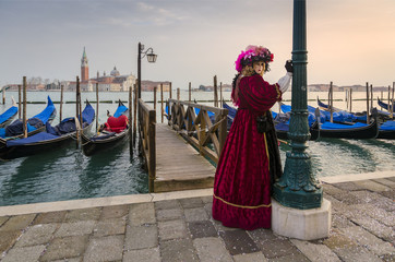 Venice carneval mask at bridge
