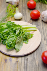 Basil and salad on a chopping Board