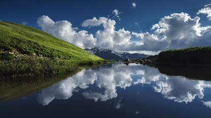 Beautiful nature landscape of mountains with snow and green forest