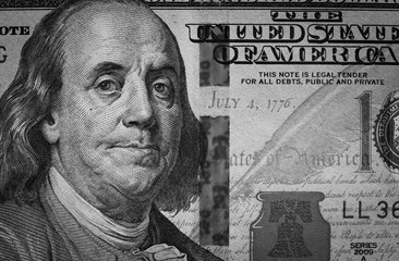 background. a hundred-dollar black and white banknote.