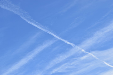 View of the blue sky and lines from the clouds.