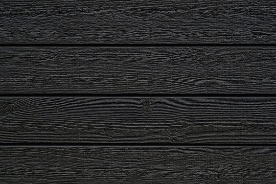Black wood wall pattern and seamless background