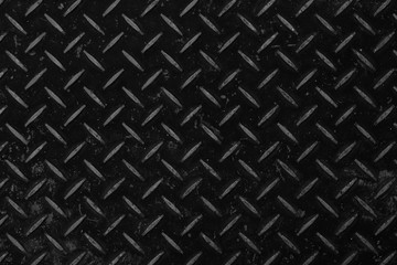 Black metal diamond plate pattern and seamless background