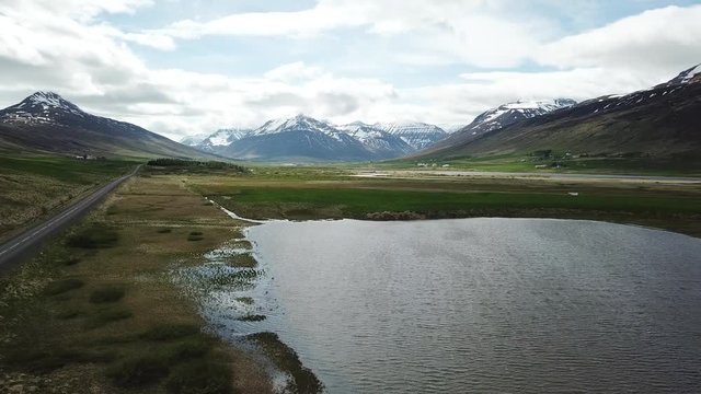 Small Lake and Mountains in Tr&ouml;llaskagi, Iceland - Moving Forward
