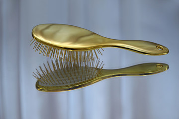 Gold color hair brush
