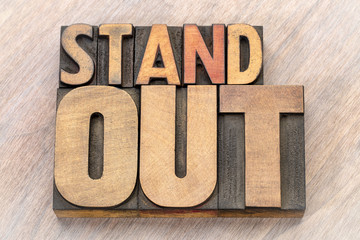 stand out word abstract in wood type