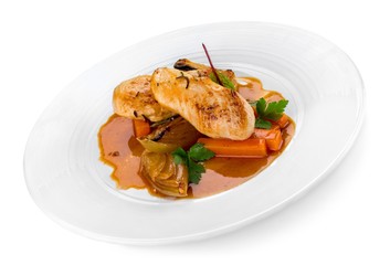 Grilled chicken breasts and vegetables