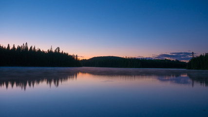 Amazing sunset scene in the wilderness of Portneuf, Quebec, Canada