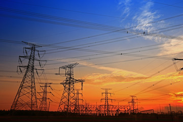 Electric tower, silhouette at sunset