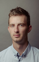 Obraz premium Portrait of a smart serious young man