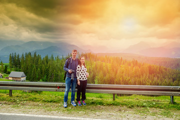 Tourists couple in the mountains