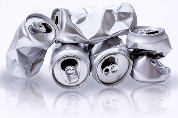 Crumpled aluminum can, empty can and aluminum can isolated on white background.