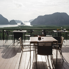 Tables and chairs in restaurant
