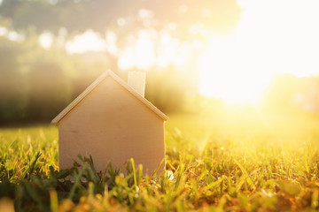 Image of vintage house in the grass, garden, forest or park at sun light.