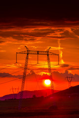silhouette of pylons at sunset