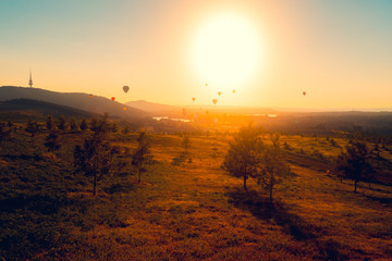 Helium balloons flying over Canberra for Enlighten festival