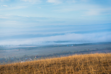 Obraz premium Morning fog in the autumn season